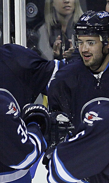 Setoguchi scores twice as surging Jets slip past Canucks